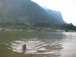 Heather has no hesitation in diving into the Nam Ou river