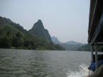 huge limestone karsts line the Nam Ou river