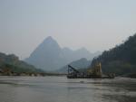 panning for gold on a big scale on the Nam Ou river