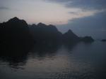 reflections in the evening light in Halong Bay