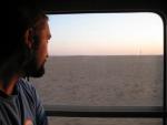 Drew contemplates the barren landscape