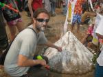 finishing touches to the sand castle stupa